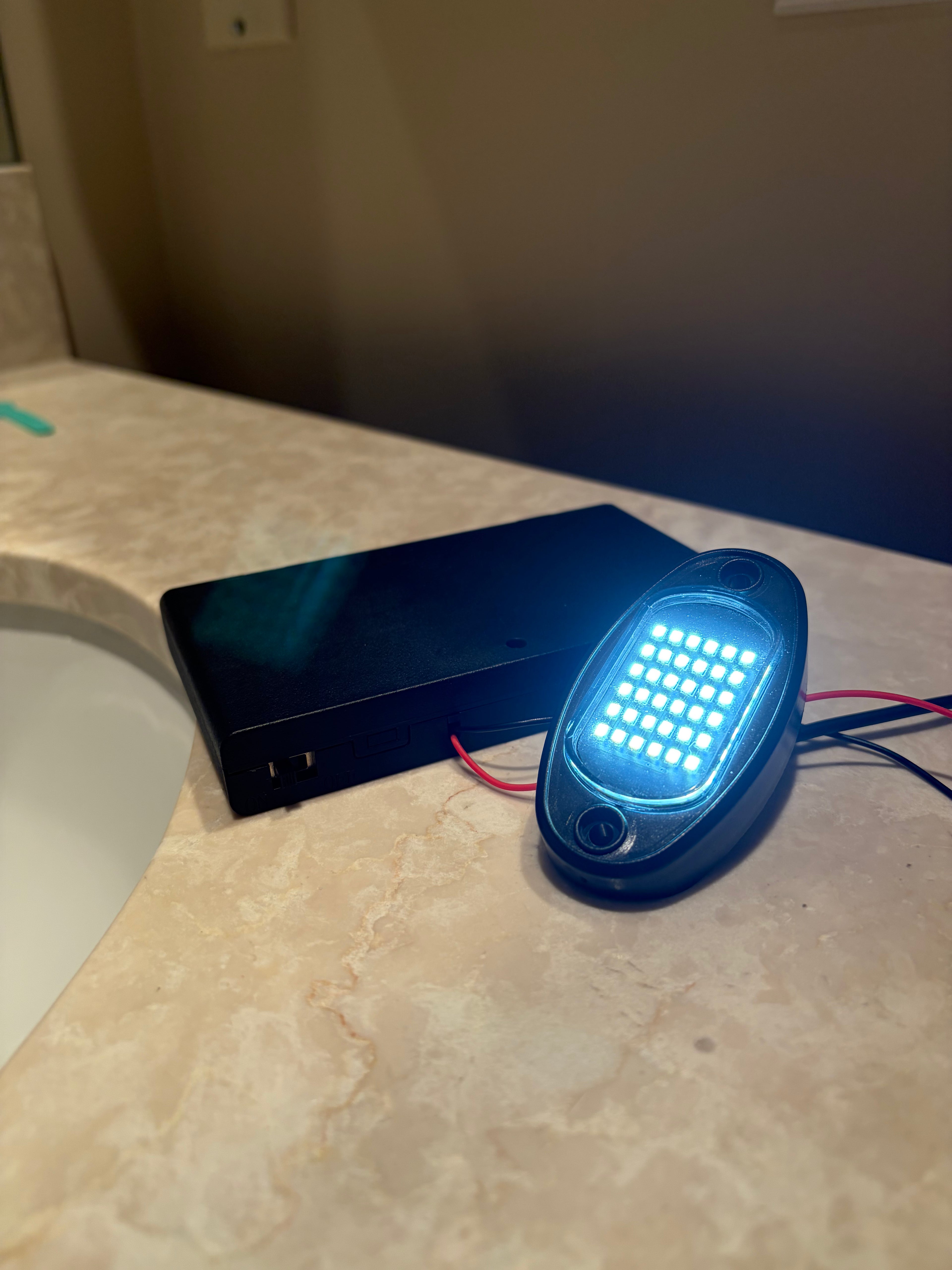 Battery powered rock light